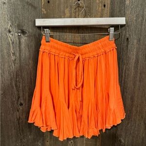 Pleated Orange Skirt